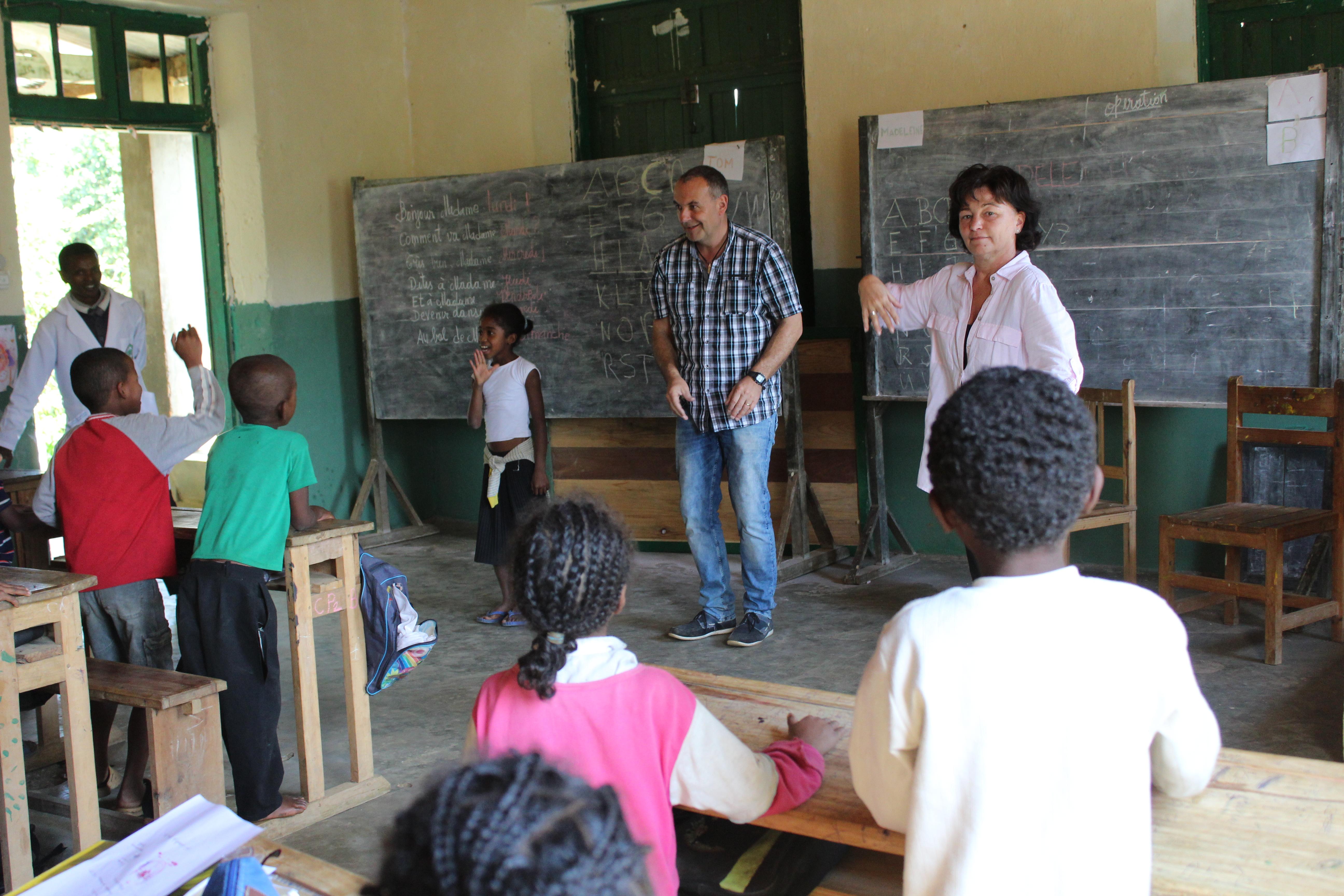 Projects Abroad volunteers sing songs with their students while they volunteer teaching English in Madagascar Older volunteer run a sing along class with the students at our volunteer teaching placements in Madagascar